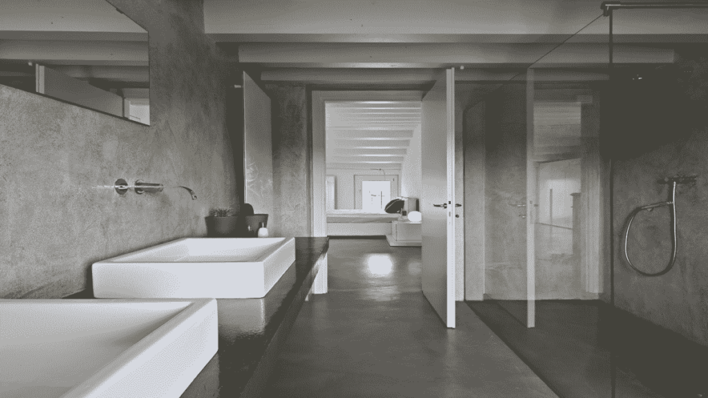 Foto van een strakke moderne badkamer met gietvloer.