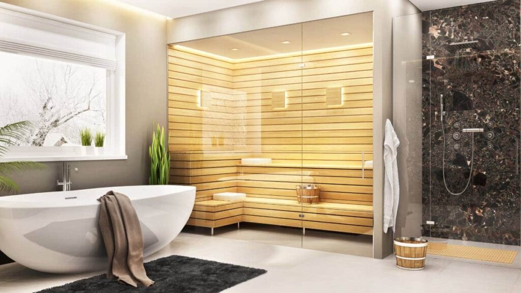 Luxe badkamer met ruime sauna voor meerdere personen, ligbad en inloopdouche. 